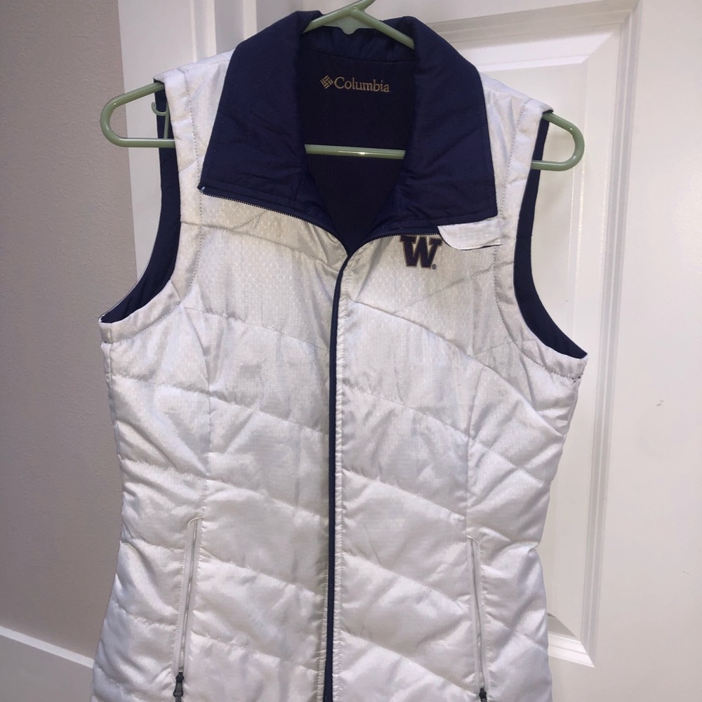 White/purple reversible vest.